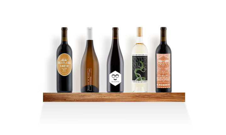 5 Bottles of Wine on a Wooden Shelf